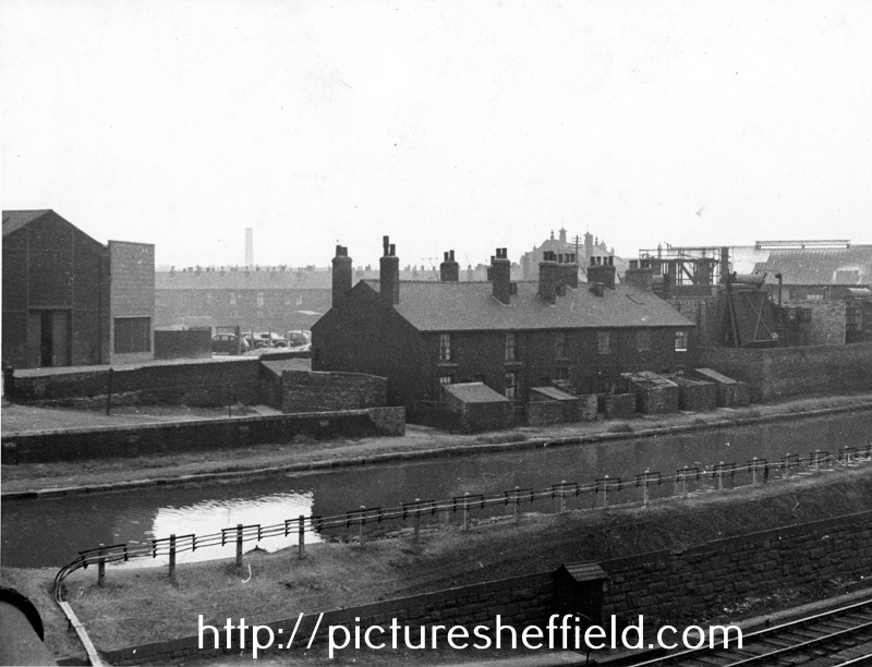 Nos. 7-12, Canal Cottages, Tinsley Park Road (demolished 1958) showing the Electricity Sub Station (right) and Sheff and SYK Navigation from Broughton Lane Bridge 