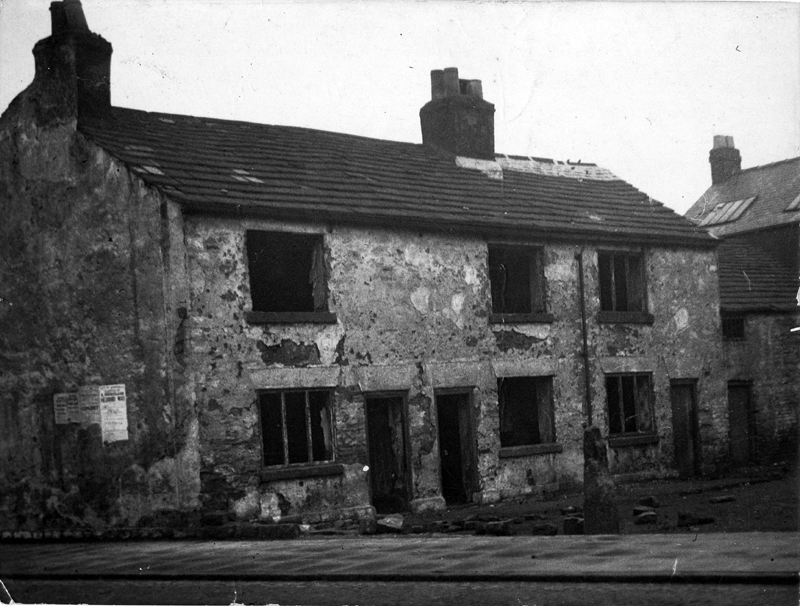 Unidentified Cottages information with the photograph indicates they are cottages at Marble Arch, Worksop Road, Attercliffe but the poster on the wall reads, City of Sheffield Election of a Councillor Hillsborough Ward
