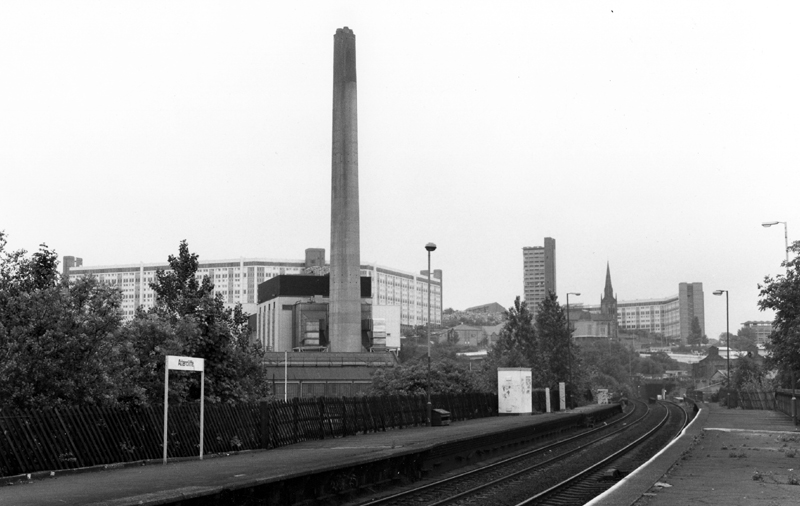 Attercliffe Road Station looking towards Bernard Road Incinerator with Hyde Park Flats and St. John's Church Park in the background 