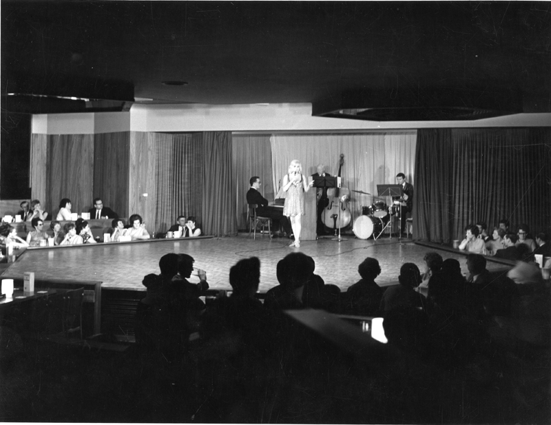 Diana Dors (1931-1984) on stage at the Cavendish Club, Bank Street