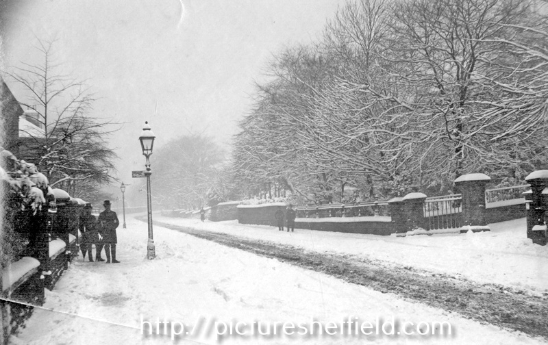 Snow covered Glossop Road with the junction of Beech Hill Road (extreme right) looking towards St. Mark's Crescent (right)