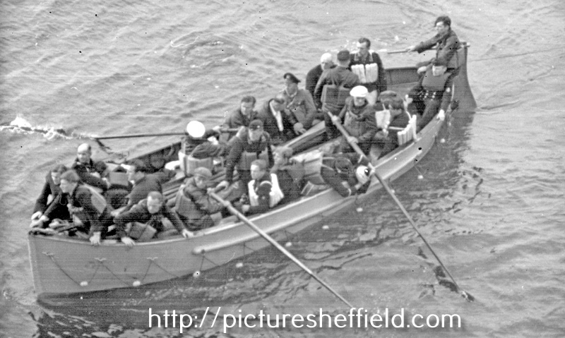 Survivors from German supply ship, probably coming aboard H.M.S. Sheffield, WWII