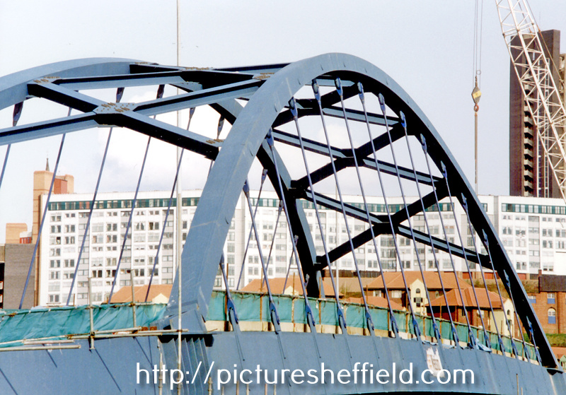 Park Square Supertram Bridge, at bottom of Commercial Street, during the construction of Supertram. Park Hill Flats in background