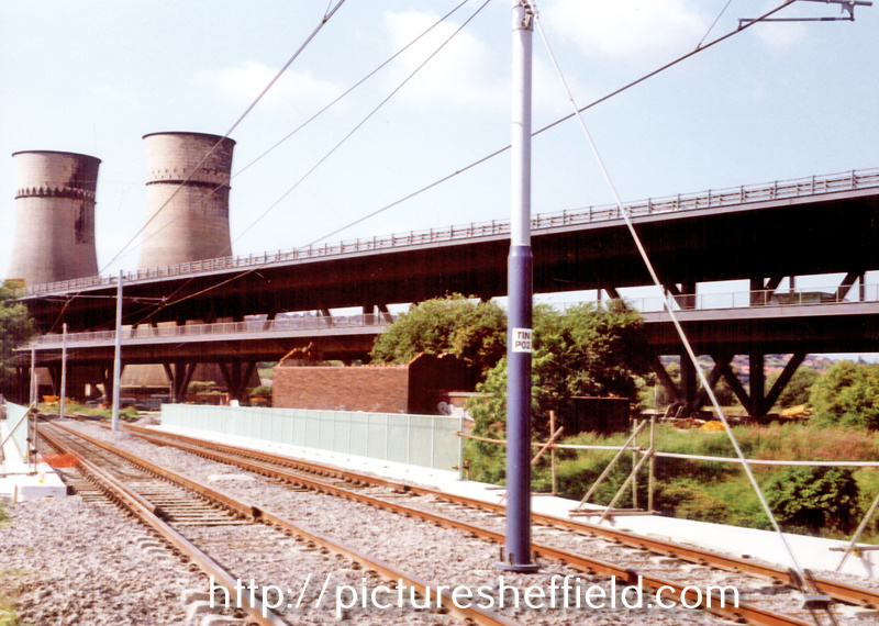 Bridge over the River Don between Meadowhall South junction and Meaowhall Interchange with Tinsley Viaduct and Blackburn Meadows Cooling Towers on left
