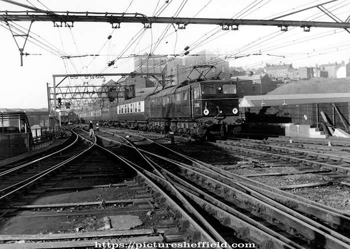 Electric locomotive EM2 Co-Co No. 27005 Minerva passing Bridgehouses and entering Victoria Station from west