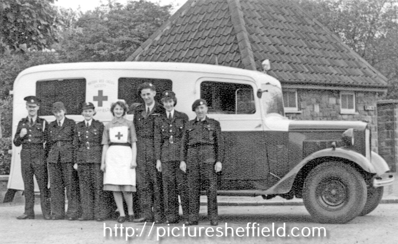 British Red Cross ambulance and crew, possibly in Chapeltown area