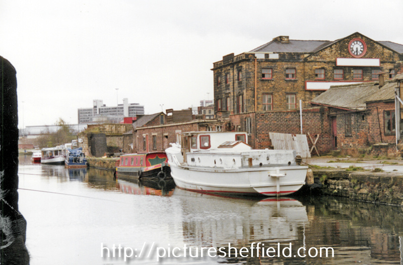 Various water transport moored near the derelict Sheaf Works on the SYK Navigation