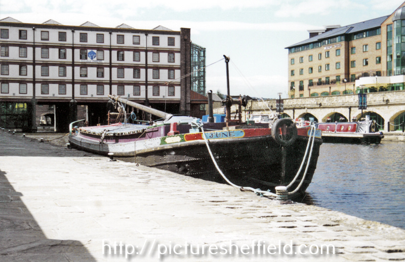 The Straddle formerly the Straddle Warehouse, Victoria Quays, Canal Basin with the keel June moored in the foreground and Stakis Hotel right
