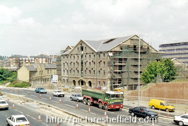 Renovated Terminal Warehouse and Merchants Crescent Coal Offices, Canal Basin and traffic on Exchange Place heading towards Sheffield Parkway in the foreground