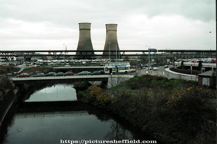 View of the River Don from the footbridge linking Meadowhall Transport Interchange and Meadowhall Shoppimg Centre looking towards Tinsley Viaduct and the Cooling Towers
