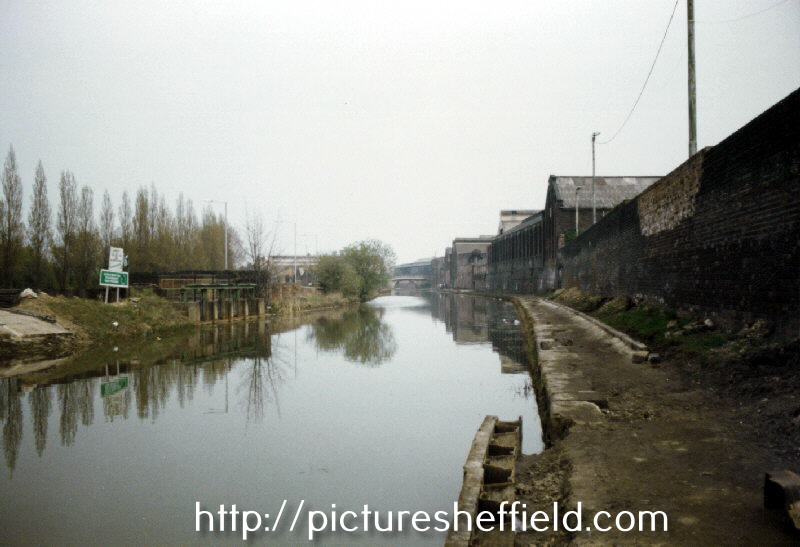 Sluice gates near Effingham Road (left) looking towards Bacon Lane Bridge, Sheffield and South Yorkshire Navigation showing the Towpath before restoration