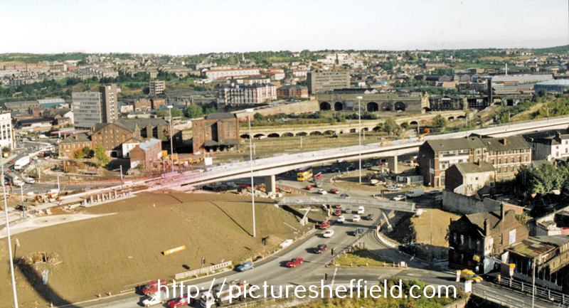 Supertram Viaduct under construction at Park Square with the Canal Basin during refurbishment