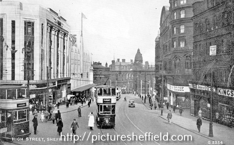 High Street looking toward Commercial Street with policeman on point duty; Change Alley between No.76-8 G.A. Dunn and Co., hatters and No. 80-84 Alexandre Ltd.(Tip Top Tailors); Montague Burtons Ltd. tailors and CandA Modes (left) and