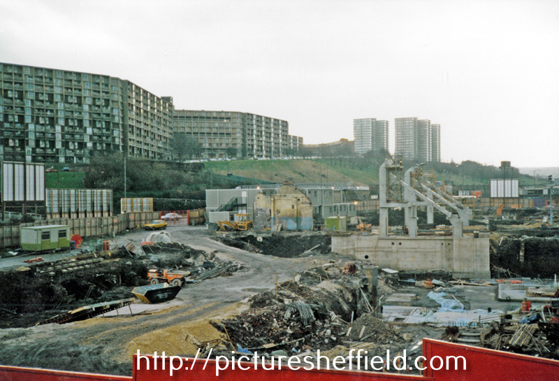 Construction of Ponds Forge Sports Centre, Sheaf Street with Claywood Flats (left) and Norfolk Park Flats (right) in the background