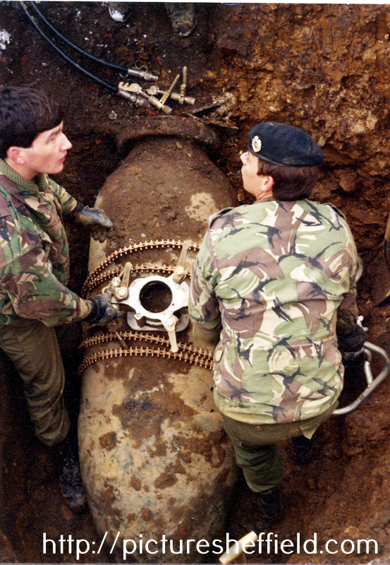 Royal Engineers Bomb Disposal experts diffusing Hermann 1,000kg bomb, Lancing Road which was dropped 12-13th December 1940 discovered during excavation work for drain laying 