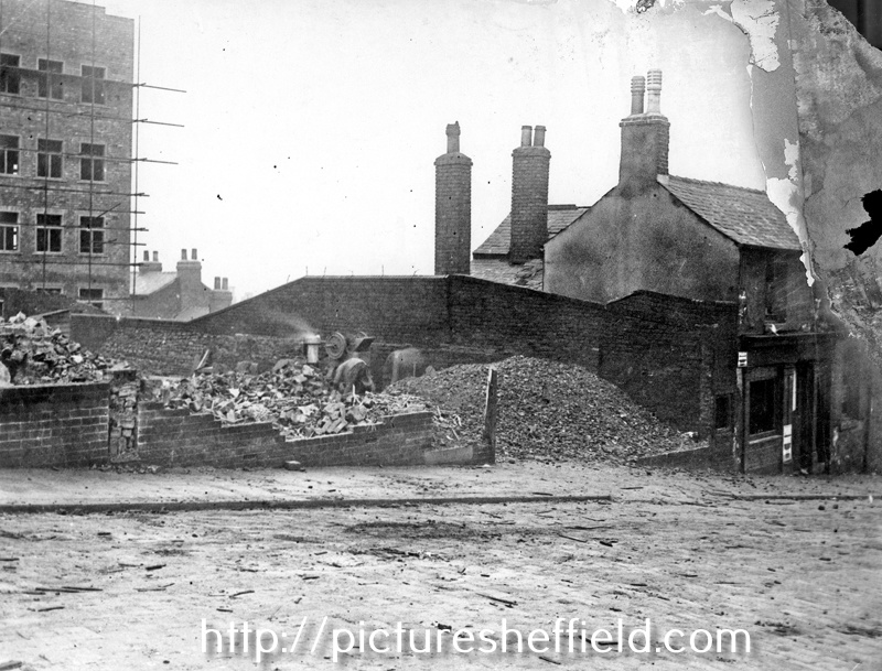 Bard Street, demolition of No. 42, Feathers Inn. Construction of Embassy Court in background