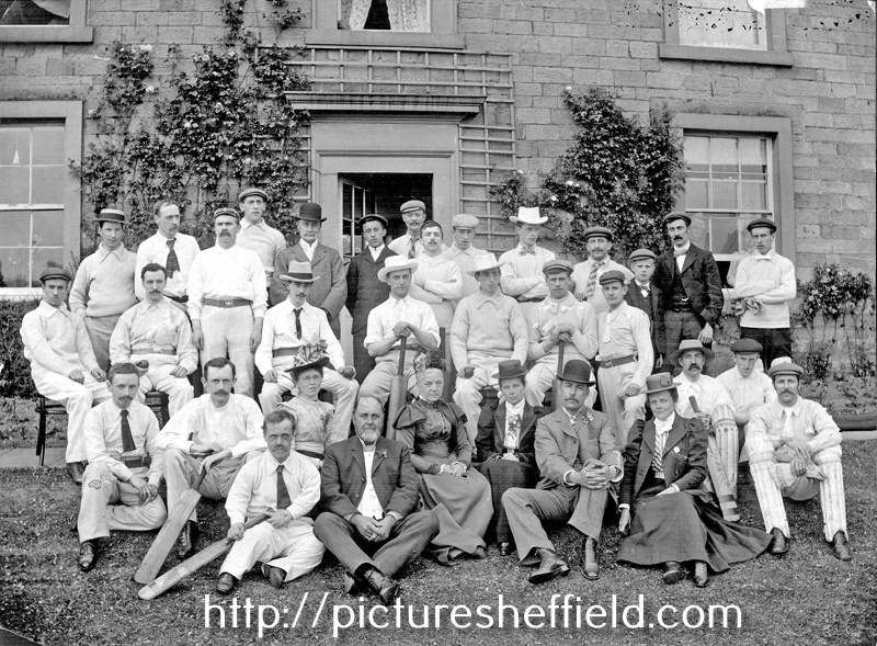 Members of a cricket team and friends, J.G. Graves seated 5th from right, wife Lucy on his right
