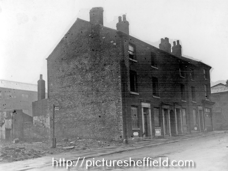 Unidentified Street in an Unidentified Area, off St. Mary's Road. Sign on left reads 'site for disposal'