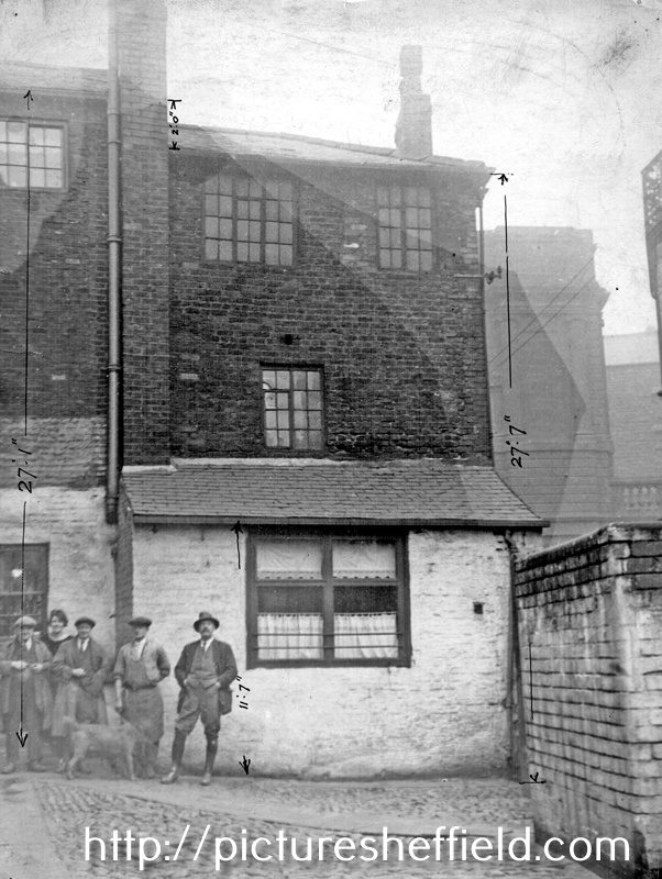 Rear of Nos. 12 (left) and 14 Waingate. No. 12 Rose and Crown public house, No. 14 James Walker and Co. Ltd. Castle Hill, right. Building in background is the Court House