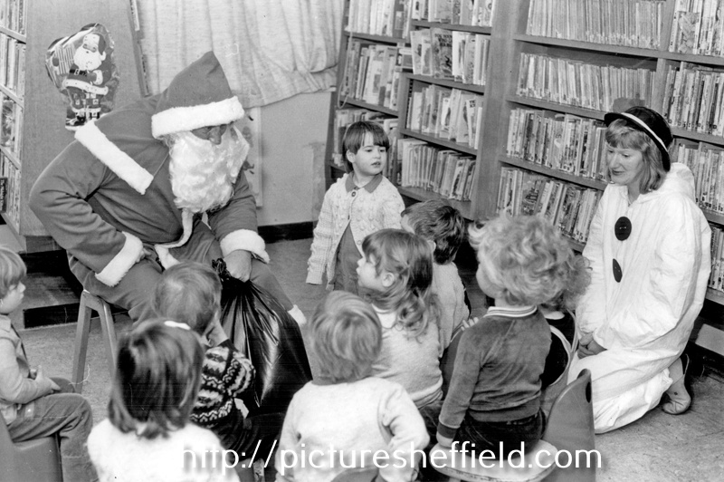 Father Christmas visiting children at Gleadless Library