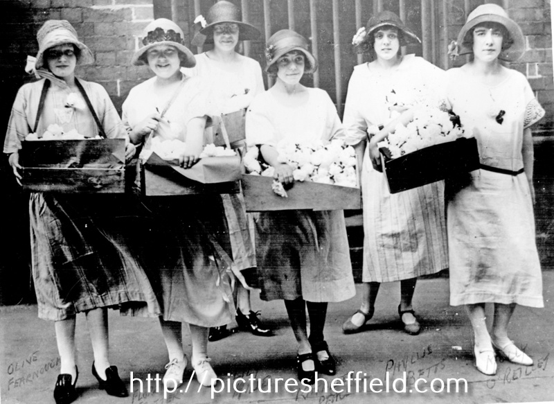 Girls handing white roses out as a promotion for the showing of the film 'The White Rose' at the Albert Hall