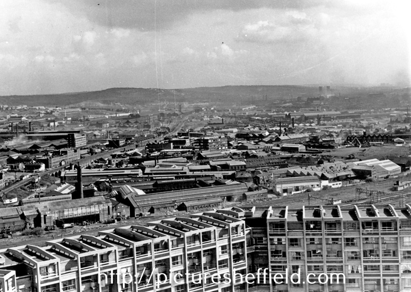 Elevated view from Hyde Park Flats looking towards the Industrial Don Valley and Wincobank Hill, showing Attercliffe Road Station and Park Iron Works (centre left before the 3 arched viaduct) and College of Technology Department (centre right)
