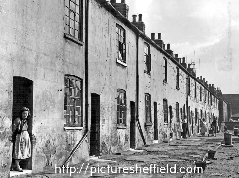 Rear view of a row of unidentified terraced housing in an unidentified location