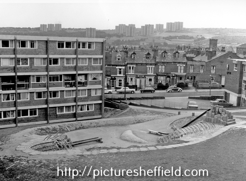 Lansdowne Flats and playground, looking towards Club Garden Road, Cross Guns public house right