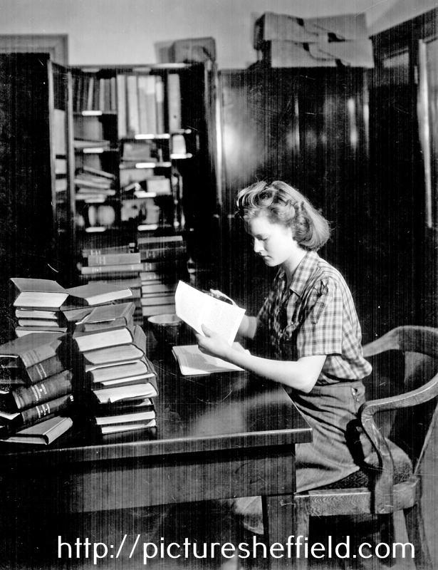 Miss Rothney repairing books, Central Lending Department, Central Library, Surrey Street