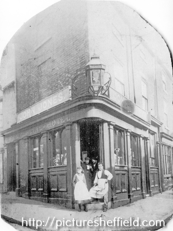 Commercial Hotel, landlord John Jones, No 34, Button Lane and junction of Carver Street with Ginni Jones and unknown barman outside. Building on right has 'Moorhead Fish Restaurant' sign