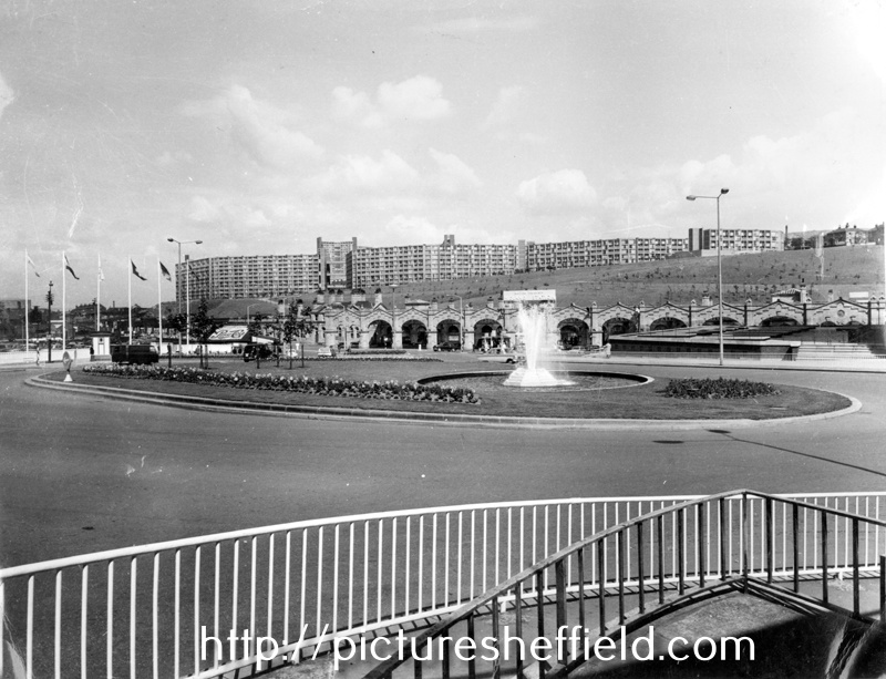Sheaf Square Fountain in front of Sheffield Midland railway station with Park Hill Flats in the background