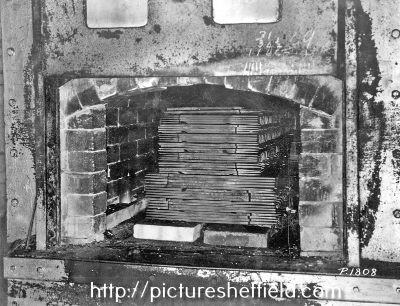 Files in the hardening furnace at English Steel Corporation, Holme Lane Works