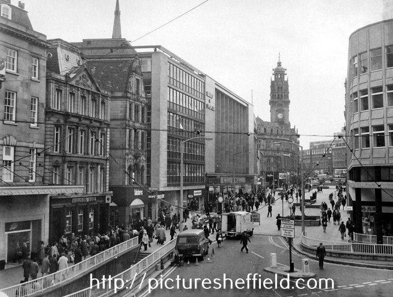 Elevated view of Fargate from the junction with High Street/ Church Street showing Boots; Barclays Bank; Salisbury's Handbags Ltd.; Richard Shops; Alexandre Ltd., tailors; Marks and Spencer Ltd. left and East Midlands Gas Shoreroom right