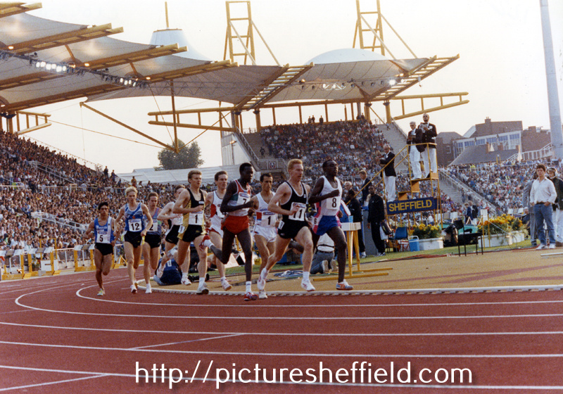 Eventual winner in a UK All Comers Record, No.11, Peter Elliott from Rotherham and second place Steve Cram (No. 1 on the outside) during the 1500m at the McVities Challenge, Don Valley Stadium