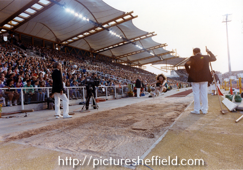 Action for the T.V. cameras in the womens long jump, The McVities Challenge, Don Valley Stadium 