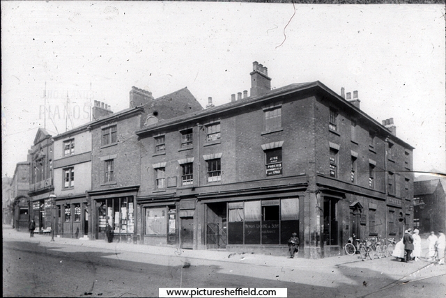 Nos. 102 - 114 Barkers Pool at junction of Pool Square, right. Premises include No. 102 Thomas Cocking and Sons, accountants, No. 112 White Lion Hotel and No. 114 John Hoyland and Son piano dealers left