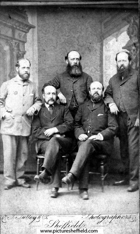 Studio portrait of unidentified group of men