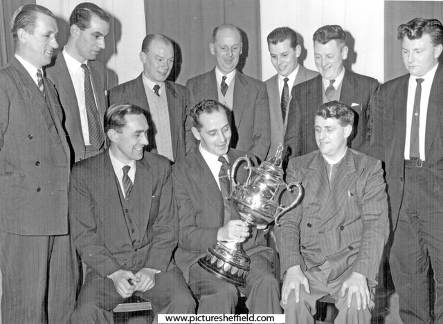 English Steel Corporation cricket team cup winners presentation at the Sports Club Dinner, Captain Bob Short with the Cup