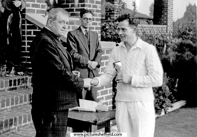 Bob Short receiving the cup with Gus Gasgoine in the background,  English Steel Corporation Sports Ground , Shiregreen Lane