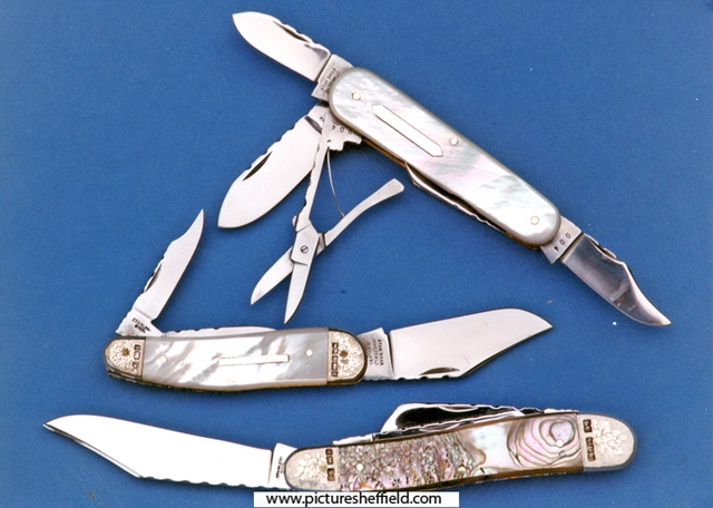 Pearl and abalone exhibition knives by Stan Shaw