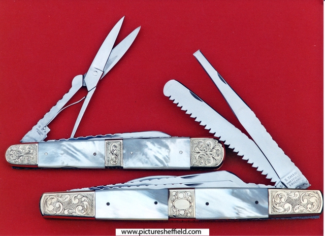 Pearl exhibition knives by Stan Shaw