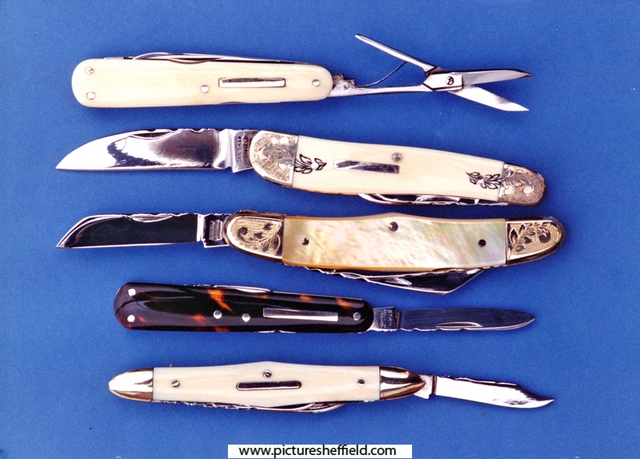 Pocket-knives in ivory, tortoiseshell, and 'gold' pearl by Stan Shaw