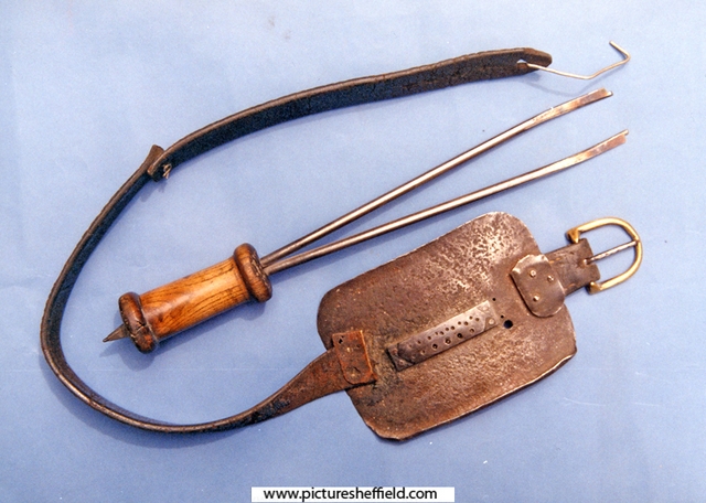 Two-legged parser and breastplate for cutting shields (nameplates) in pocket-knives at Stan Shaws cutlery workshop