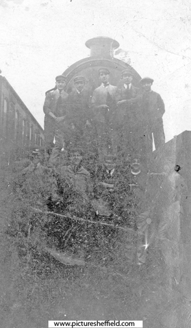 Apprentices with a steam locomotive at the LNER Engine Yard, Darnall
