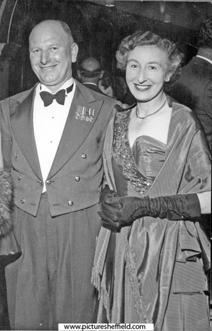 Wing Commander Ken A. Mummery, R.A.F. Norton and wife Sally (Isabel) dressed for a ball mid 1950's