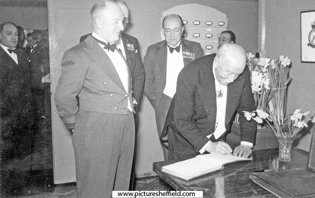 R.A.F. Norton mid 1950's with the Master Cutler signing the visitors book and Wing Commander Ken A Mummery left