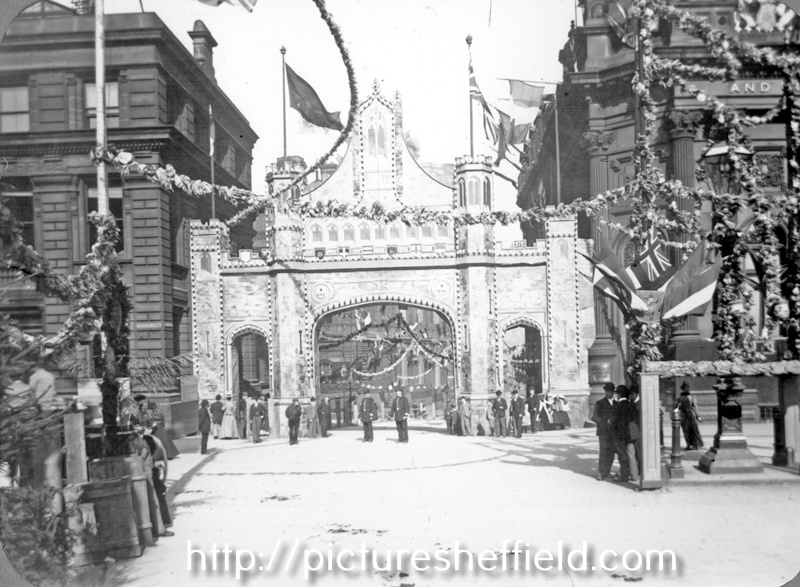 Decorative arch at the top of Commercial Street to celebrate Queen Victoria's visit, photographed from High Street. General Post Office, Haymarket, left