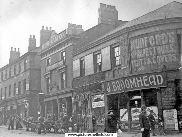 Exchange Street from Furnival Road to Exchange Lane (foreground), 1913-1914, No. 57 John C. Broomhead, hairdresser, No. 55 J.H. Mudford and Sons, rope and twine manufacturers, Nos. 51 - 53 Durham Ox public house