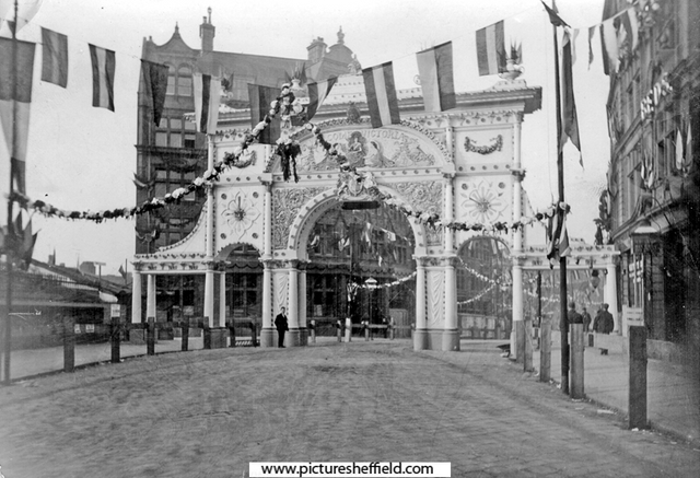 Pinstone Street showing decorations for Queen Victoria's visit to officially open the Town Hall