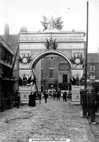 Decorative arch to celebrate the royal visit of Queen Victoria, on junction of Broad Street and South Street, Park, photographed from South Street looking towards Broad Street, premises in background include Broad Street Cafe